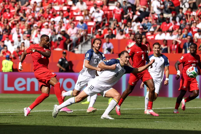 Cyle Larin scores for Canada against Bosnia in the World Cup.