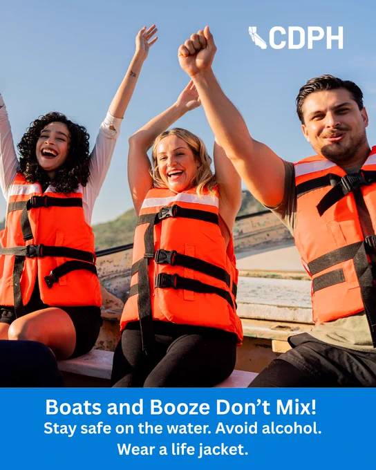 A group of people joyfully sitting on a boat while wearing life jackets. "Boats and Booze Don't Mix! Stay safe on the water. Avoid alcohol. Wear a life jacket."