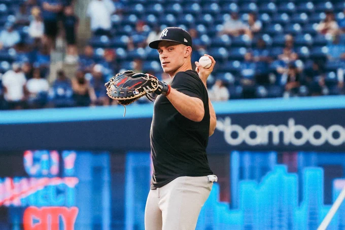 Ben Rice tosses pregame in Toronto.