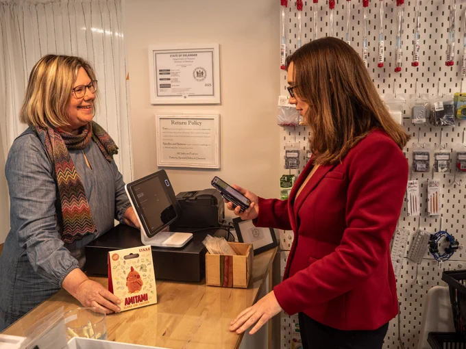 Rep. McBride checks out at a local business in Smyrna, Delaware. 