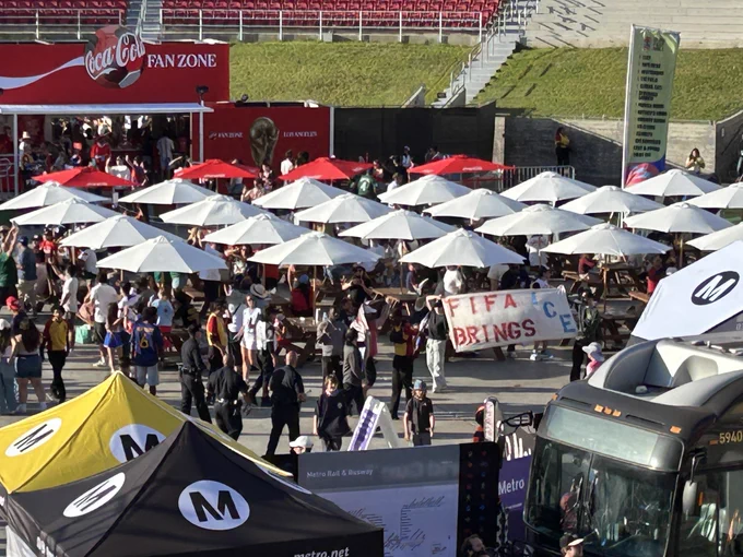 Banner that reads FIFA BRINGS ICE at the Coca Cola Fanzone 