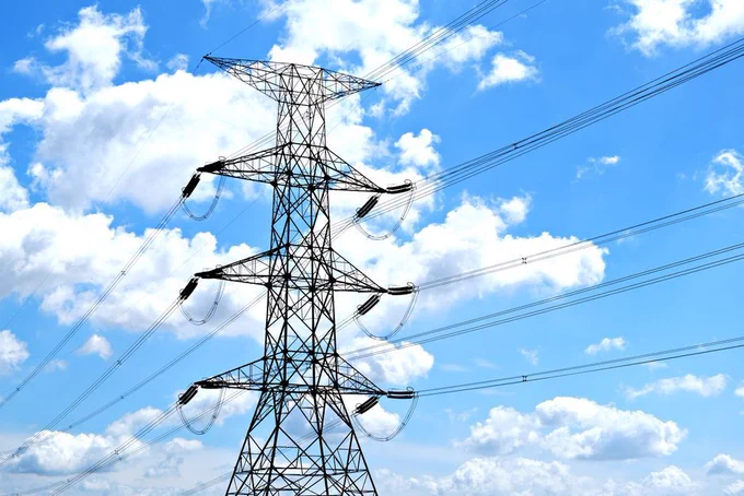 Cover image illustrating: AES Corporation's contested $33.4 billion power infrastructure sale to a BlackRock-led consortium and shareholder concerns over disclosure and grid ownership.
