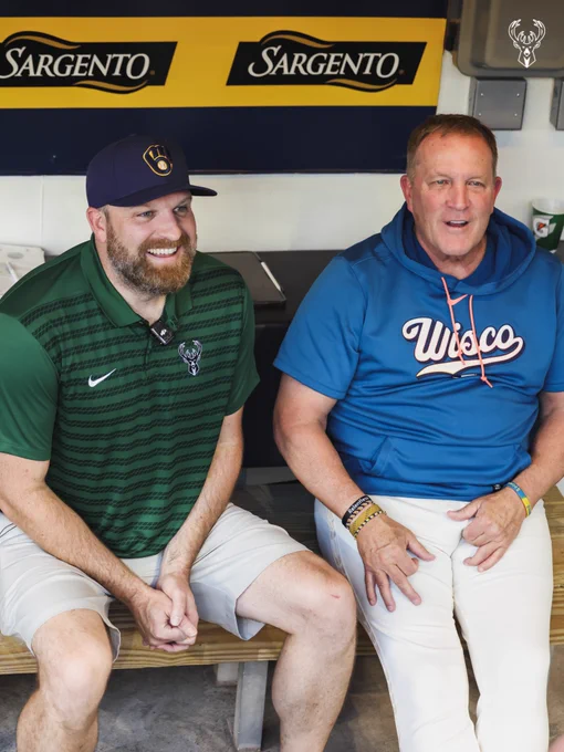 A photo of Bucks Head Coach Taylor Jenkins and Milwaukee Brewers manger Pat Murphy in the dugout at American Family Field.