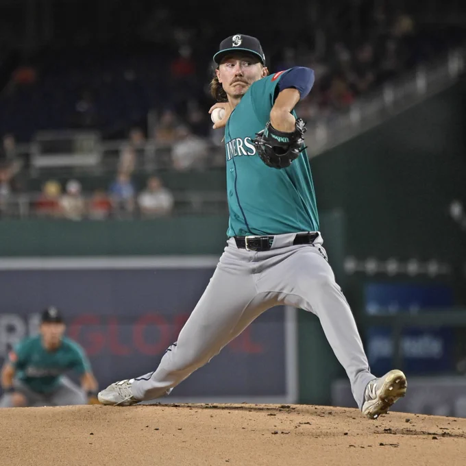 Bryce Miller delivers a pitch wearing a teal Mariners uniform with silver lettering.
(Photo: Alyssa McDaniel/Major League Baseball)