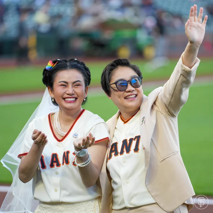 Couple participate in a vow renewal ceremony pregame