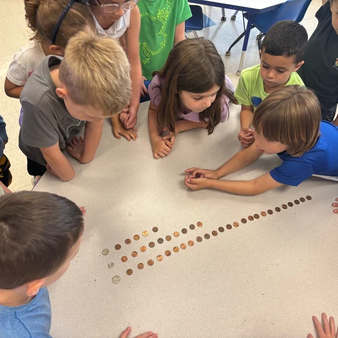 students learning about coins