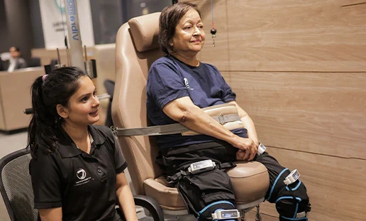 A neurorehabilitation specialist guides a patient using an advanced robotic gait training system at Walk Again Rehab. The AI-assisted mobility technology supports recovery for spinal cord injury, stroke, and neurological rehabilitation patients, helping improve balance, strength, and walking ability.
