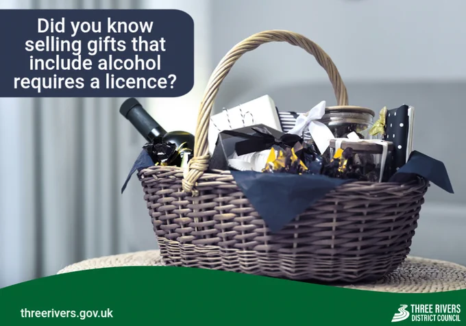 Image of a gift hamper containing wine. Text reads, Did you know selling gifts that include alcohol requires a licence?