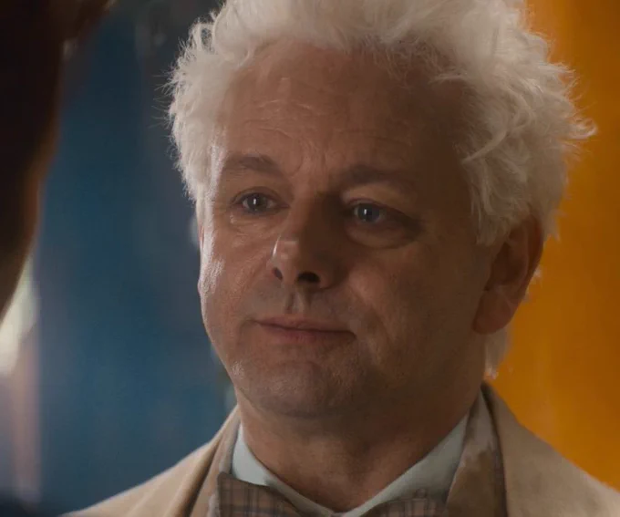 aziraphale looking at crowley resigned, disappointed in the bookshop scene of the good omens finale
