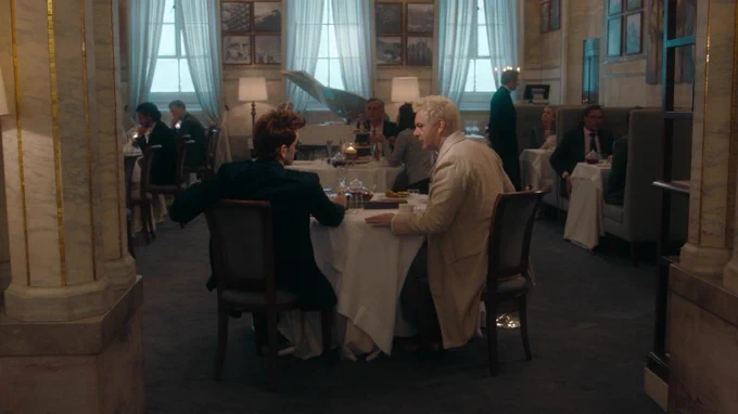 final shot of crowley and aziraphale at the ritz in season one