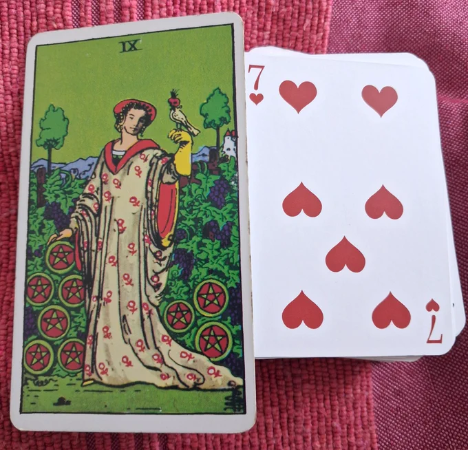 9 of Pentacles from the Albano-Waite Tarot and the 7 of Hearts 