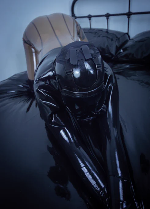 me in latex and msa bent down on a bed with latex bedsheets
full shoot on my fansite <3