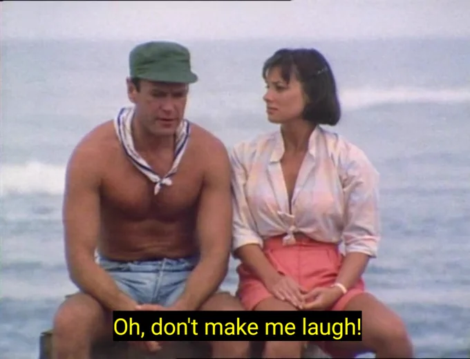A screenshot from the first episode of Planet of Fire.

Nicola Bryant as Peri Brown & Dallas Adams as Howard Foster. Howard is speaking. What he is saying can be seen on screen as yellow text. That text reads: "Oh, don't make me laugh!" 