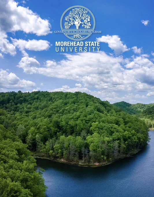 Aerial shot of Eagle Lake and the lush rolling hills of the Daniel Boone National Forest - the official Kentucky Governor’s Scholars Program is overlaying the top of the image.