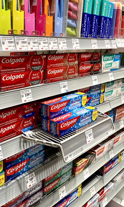 Multiple rows with toothpaste boxes, toothbrushes, and oral sprays under bright led lighting.

https://www.shutterstock.com/g/Hitra?rid=193867524&utm_medium=nativeapp&utm_source=ctrbreferral-link

#Colgate #Elmex #Curaprox #Proodont #Biomed #Voyage #Planogram #VisualMerchandising #RetailDesign