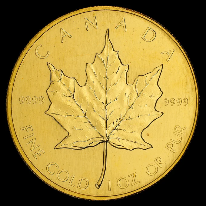 Pièce d’or ornée d’une reproduction fidèle de feuille d’érable.