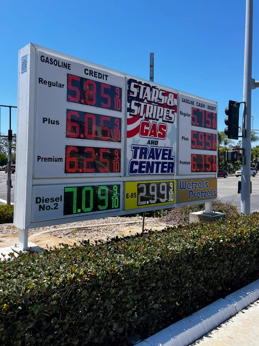 Stars & Stripes gas stations price board showing regular gasoline price at $5.75/gal and E-85 at $2.99/gal.