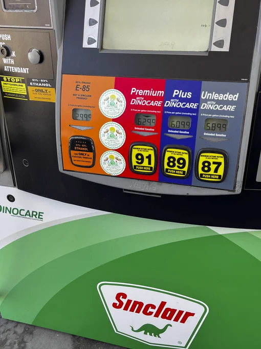 Gas pump display showing fuel options: E-85 Ethanol, Premium Plus, and Unleaded with octane ratings 91, 89, and 87 respectively.