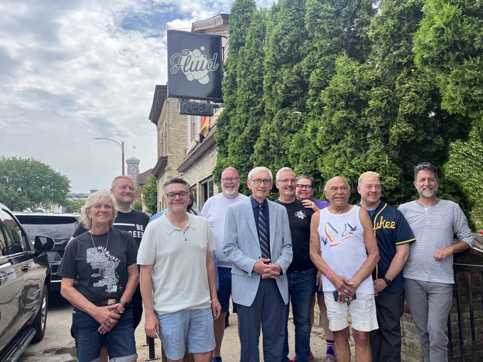 Gov. Evers poses for a group photo with LGBTQ History Project leaders