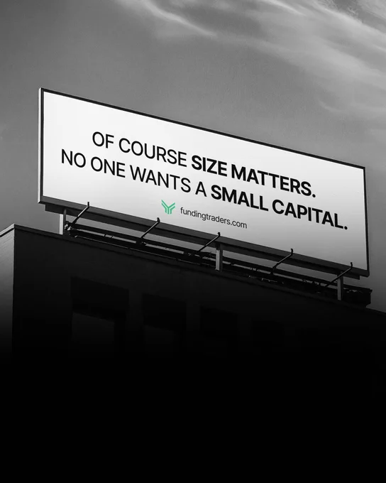 A black and white image of a billboard with a bold, eye-catching message about the importance of capital size in trading. The message is both direct and slightly humorous.