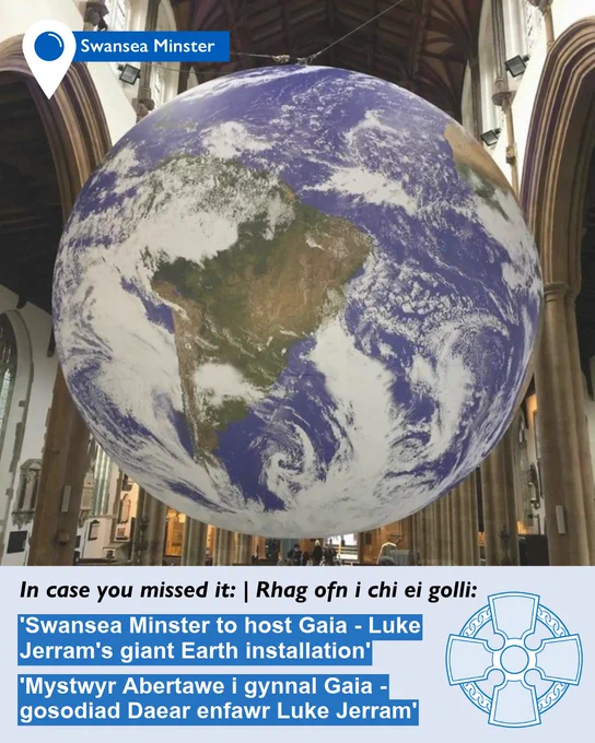 A rectangular graphic with a picture of a large art installation. Across the bottom is a light blue banner with the following text on: “In case you missed it | Rhag ofn i chi ei golli: ‘Swansea Minster to host Gaia - Luke Jerram's giant Earth installation' 'Mystwyr Abertawe i gynnal Gaia - gosodiad Daear enfawr Luke Jerram'". The Church in Wales celtic cross logo is in the bottom right corner.