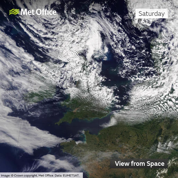 A satellite image of the UK showing clear skies across much of the south, but more in the way of cloud a lot of Scotland, Northern Ireland and northern and eastern England. 