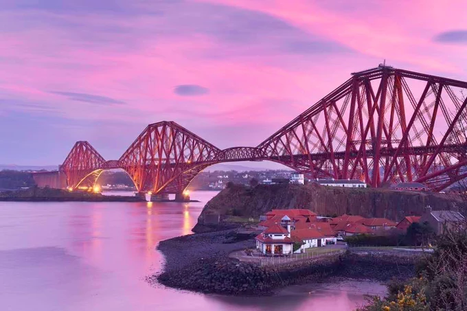Fourth bridge with a pink sunset