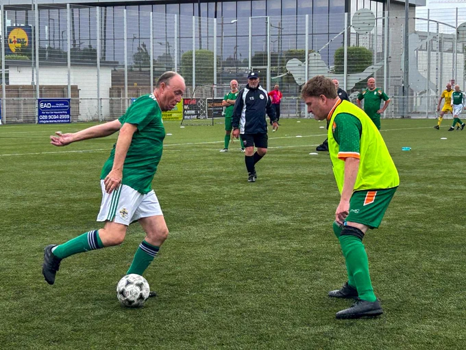 Players in an International Walking Football Tournament play a match.