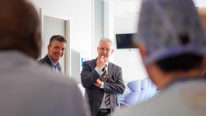 Health Minister Mike Nesbitt and Mark Gillespie, Director Surgery, Paediatrics and Women’s Health, Western Trust pictured talking to healthcare staff at Omagh Hospital and Primary Care Complex. 