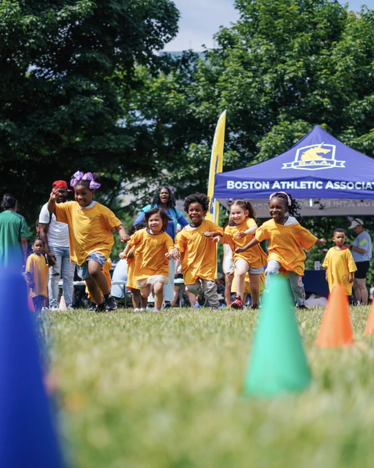 Swipe of four (4) images from the B.A.A. activation at the City of Boston’s 2026 International Day of Play celebration on the Boston Common