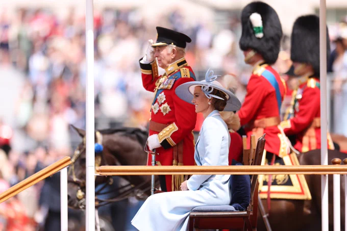 His Majesty The King, Her Majesty The Queen, and HRH The Princess of Wales watching the parade on Horseguards Parade Ground.