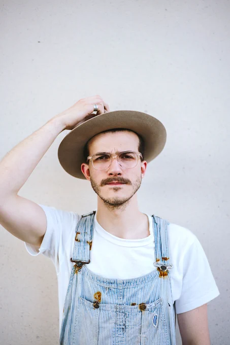 Man wearing glasses from The Optical. Co