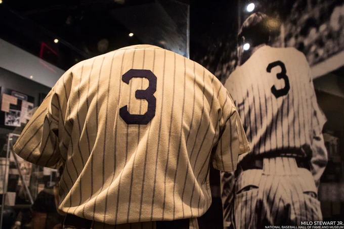 Pinstripe number 3 Yankees jersey worn by Babe Ruth opposite a Pulitzer Prize-winning photograph taken by Nat Fein on June 13, 1948. (Milo Stewart Jr./National Baseball Hall of Fame and Museum)