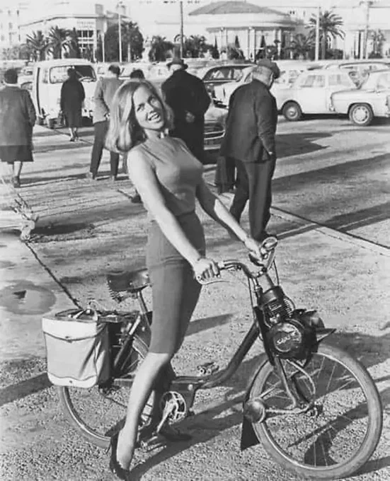 The beautiful actress Honor Blackman on a very cool Solex bike in1965 while she was in Cannes France to film the movie moment by moment.
