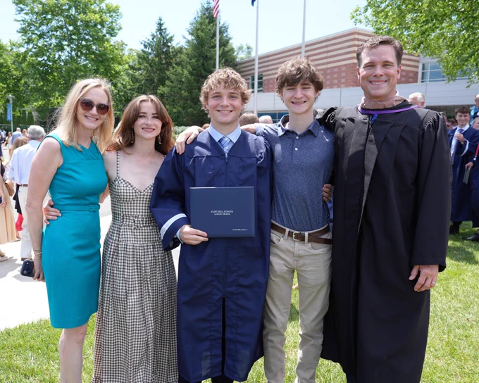 Russ Reeder as a board of trustees member for the Flint School at his son's graduation.
