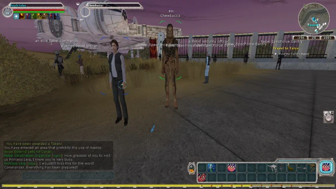 Han and Chewie, w/ the Falcon as backdrop, watch Leia