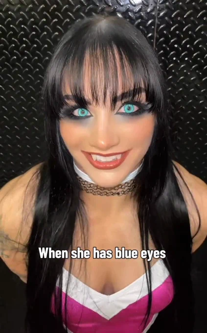 A screenshot of a TikTok video posted on June 13, 2026 by WWE professional wrestler Tatum Paxley, who's wearing wrestling gear based on Rouge The Bat from the Sonic The Hedgehog media franchise, including light blue eye contacts.

There's text at the bottom that reads:

"When she has blue eyes"