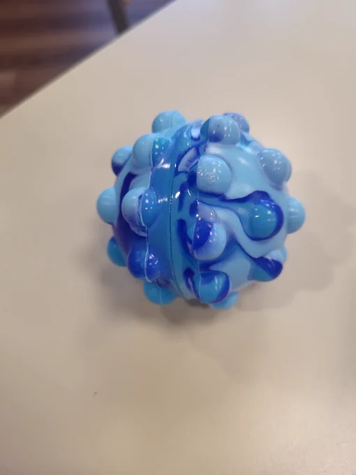 Blue swirly popper ball