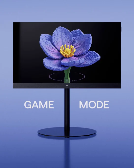 We. SEE lcd dc television displaying a detailed purple and yellow pixelated flower on a blue gradient background with 'GAME MODE' text below.
