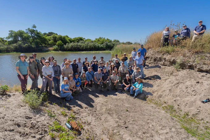 California State Parks Week Great Valley Grasslands State Park event participants posing beside the San Joaquin River