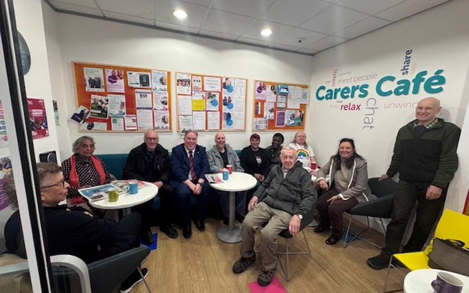 We see a photograph of Carers Café in Croydon. Jason Perry, Croydon Mayor, spent time with carers in March 2026, listening to their experiences and seeing first-hand how they are supported by Carers First across the borough. Carers First were delighted to hear positive feedback, with carers sharing how much the support means to them and the difference it makes to their wellbeing.
