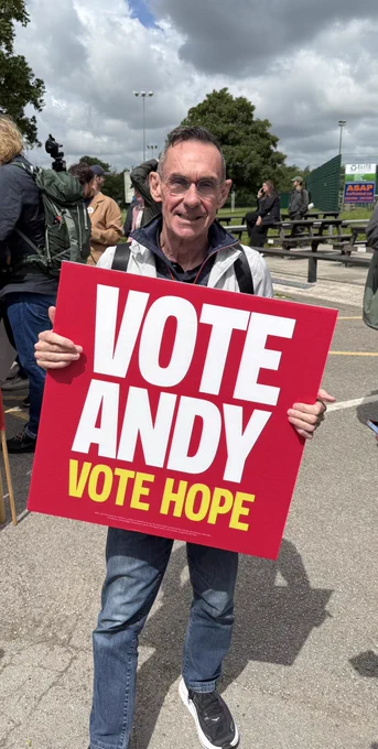Paul Mason, "campaigning" for Andy Burnham in Makerfield, holding a placard that reads:

VOTE
ANDY
VOTE HOPE

https://x.com/paulmasonnews/status/2065769364683399400
