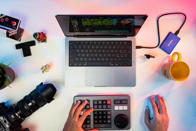 A realistic premium workspace featuring modern tech accessories, a clean organized desk, soft ambient lighting, and a productivity-focused environment built for focus and creativity.
