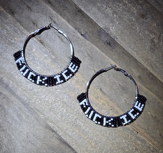 beaded silver-tone hoop earrings, black background with white lettering that spells F U C K  I C E