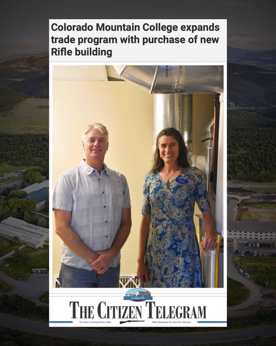Two Colorado Mountain College representatives stand inside a facility discussing the new Rifle building for the expanded trade program.