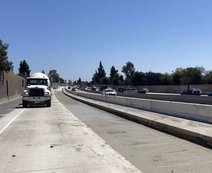 Long view of lean concrete base. 