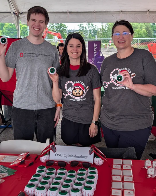 Wesley, Chrissie and Karey pose with stress eye balls