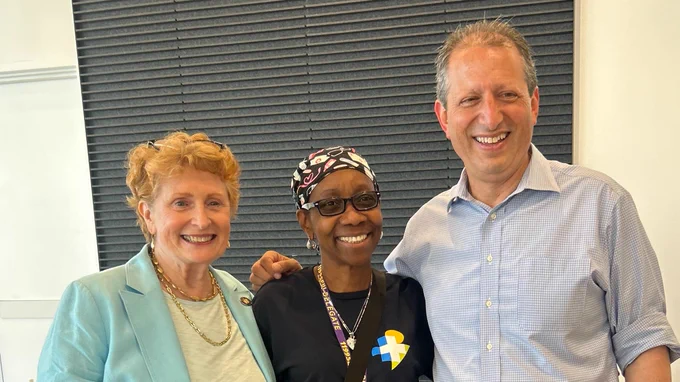 Standing with Jo Anne and a neighbor.