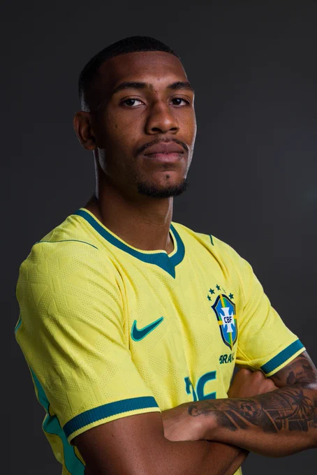 Rayan with his arms folded in the Brazil kit.