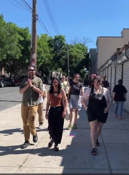 David Orkin, Claire Valdez and Samantha Kattan and volunteers leave the pollsite after voting in Ridgewood.